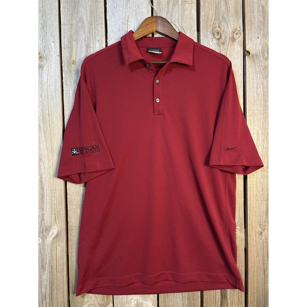 Nike Golf red polo w/ Duncan Aviation logo – L